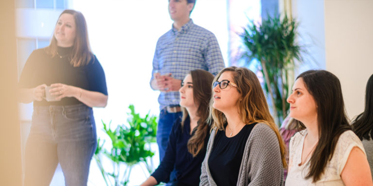 people watching presentation intently