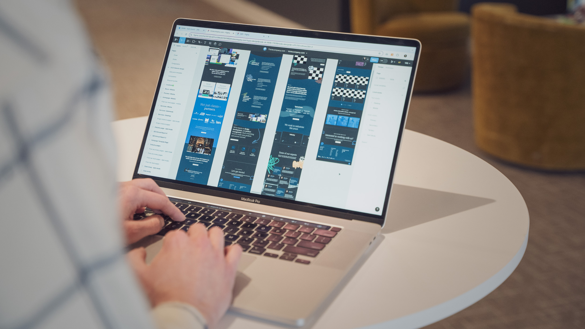 A person working in Figma on a design system and website