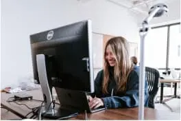 A person sitting at a computer working